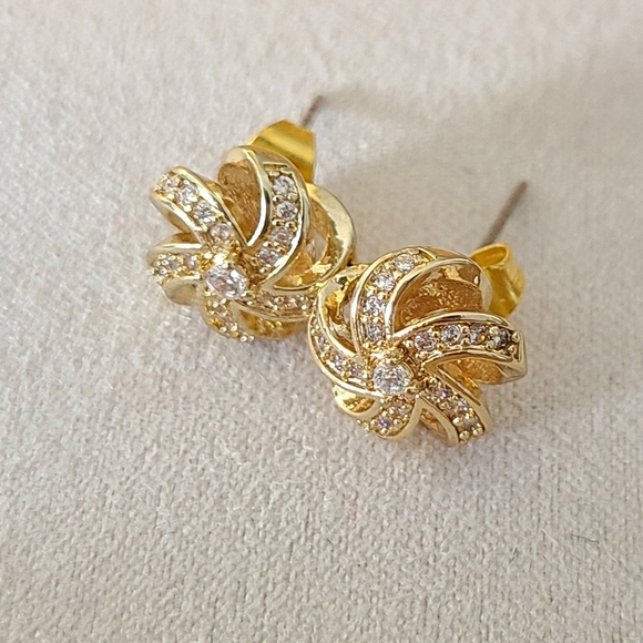 Gold Tone Swil Stud Earrings - Picture 3 of 3